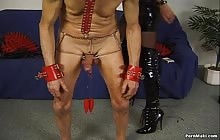 Brunette slut tortures guy in BDSM